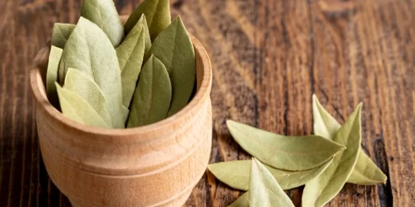 high-angle-wooden-bowl-with-bay-leaves_23-2148426117